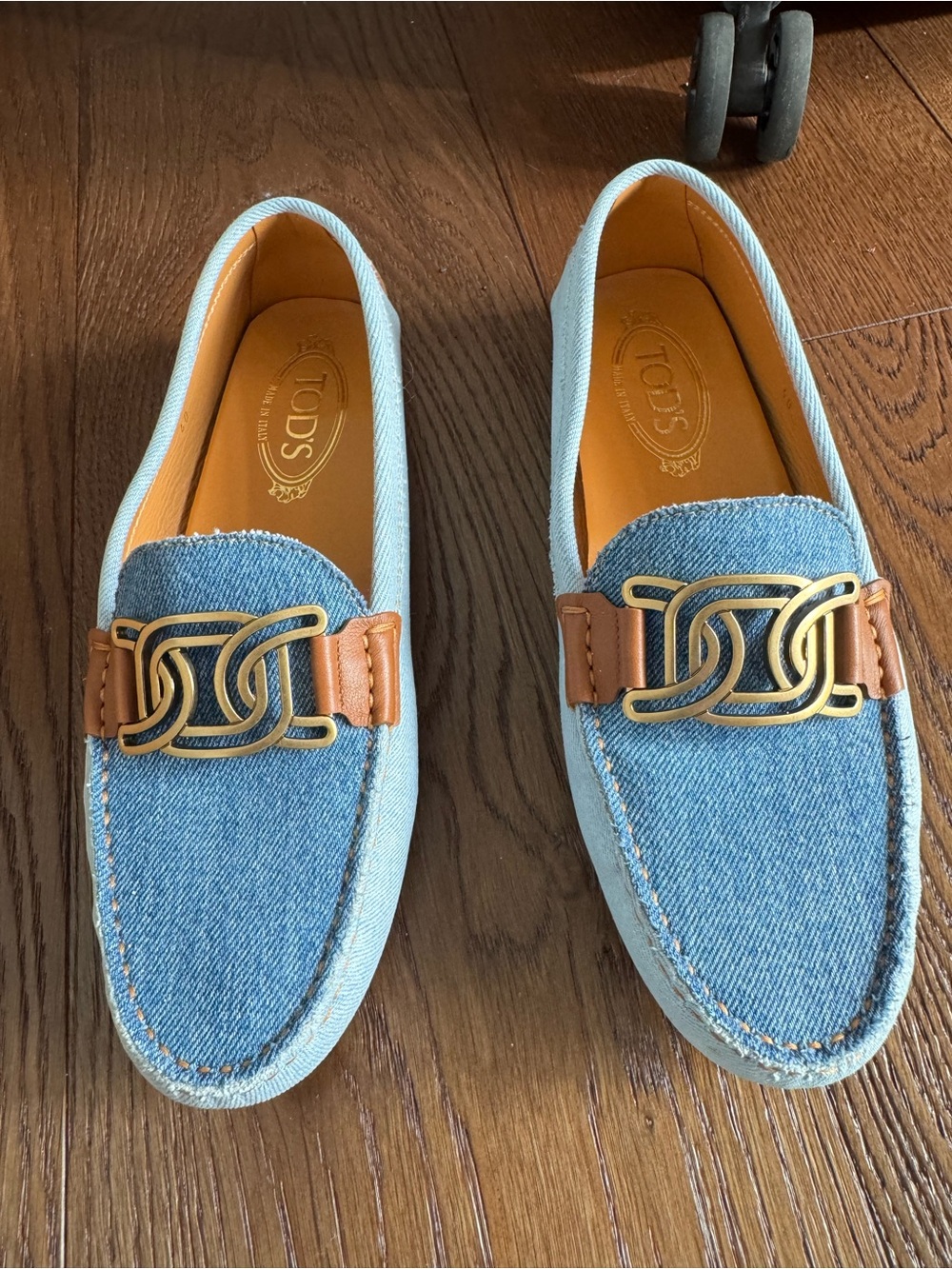Tod's Light Blue Denim Loafers with Tan Leather Trim and Gold Chain